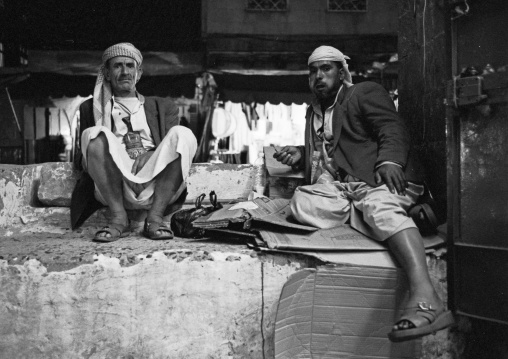 Two Men Chewing Qat While Relaxing, Black And White, Sanaa, Yemen