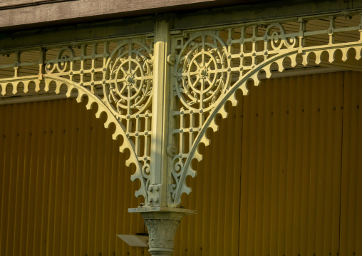 Detailed view of an ornate cast-iron bracket decorating a column at the Palacio de Ferro, Luanda Province, Luanda, Angola
