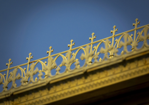Fleur-de-lis cast-iron roof cresting stands out against a clear blue sky atop the Palacio de Ferro, Luanda Province, Luanda, Angola